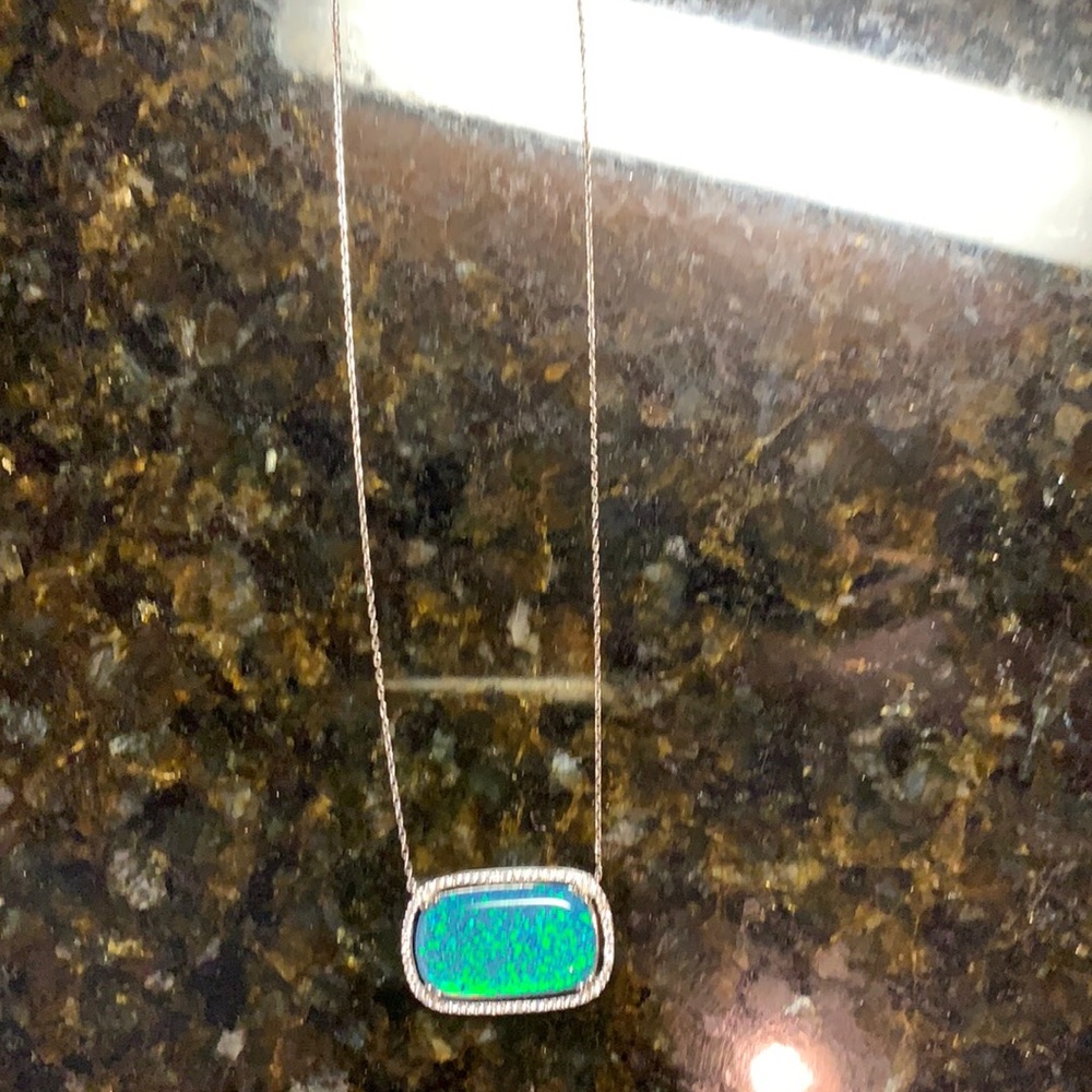 This is the sterling silver CZ and synthetic opal this piece is stunning !